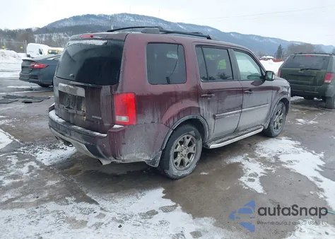 2009 Honda Pilot Touring z USA, uszkodzony, nr VIN 5FNYF48999B006521